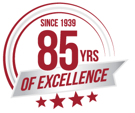 Red 85 years of excellence badge