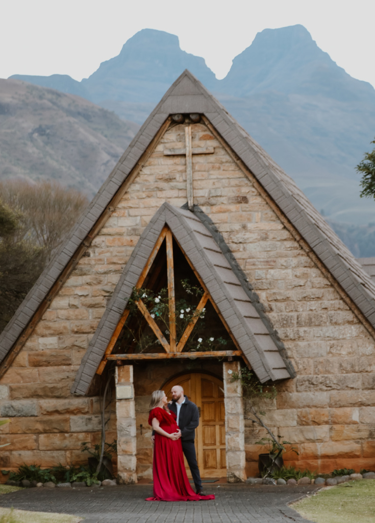 Couple standing in front of the church