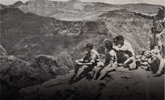 Old picture of a family in the mountains