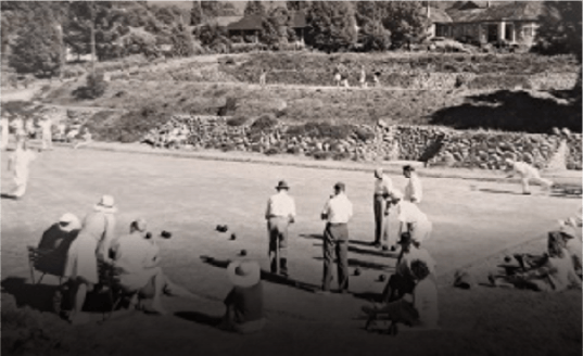 Historic picture of people playing bowls at Cathedral Peak Hotel